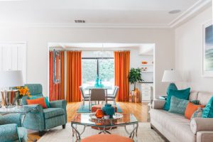 Mid Century Home with orange curtains. HausZwei Homes Kevin Polite Solid Source Realty, Inc.