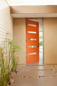 Mid Century Home with Modern Door painted orange HausZwei Homes Kevin Polite Solid Source Realty, Inc.