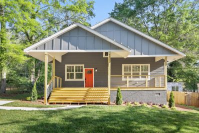 3573 Orchard Circle Decatur Bungalow front porch orange door Peachcrest Belvedere Park Homes For Sale