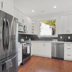 black stainless steel appliances 3573 Orchard Circle Kitchen Peachcrest Belvedere Park Homes For Sale New Construction